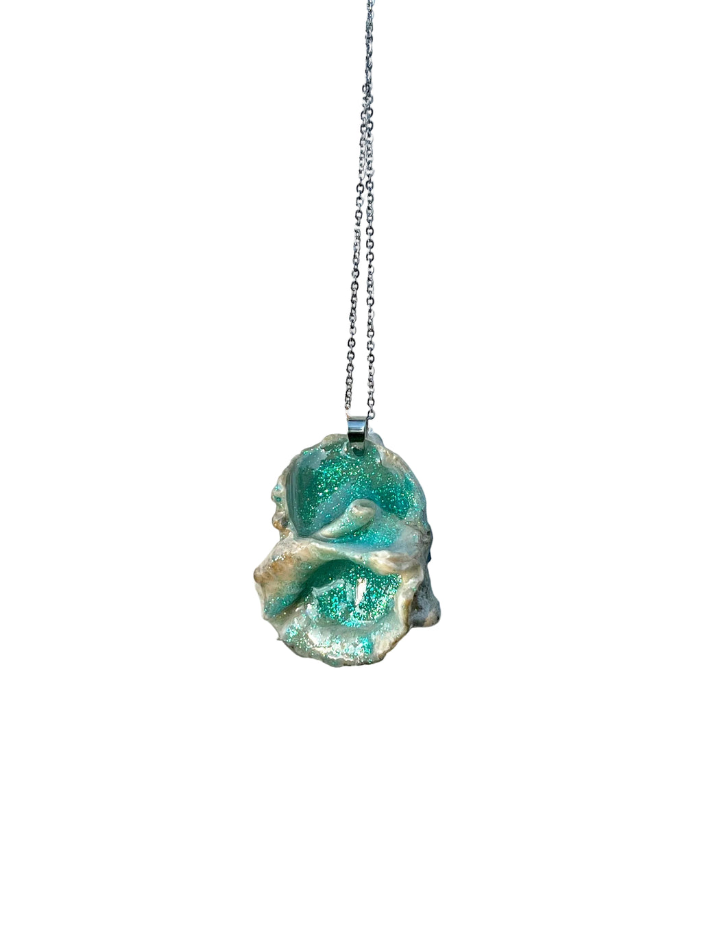 Necklace with a turquoise shell pendant on a white background
