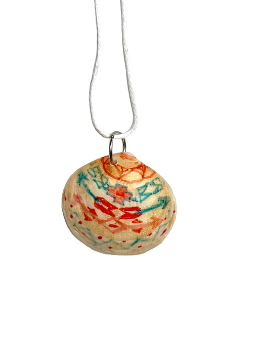 Colorful round pendant on a white background