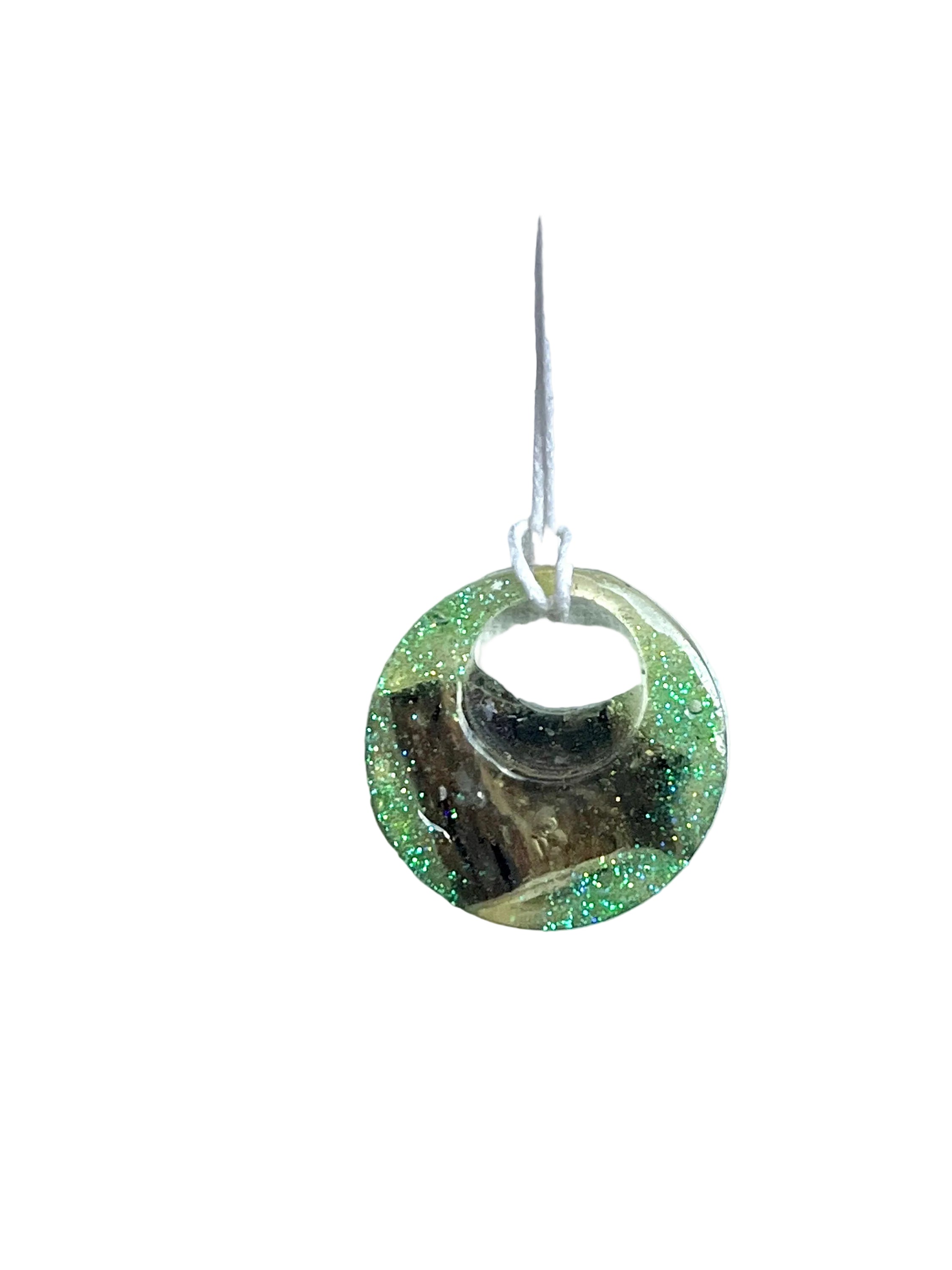 Necklace with a round pendant featuring green and silver colors on a white background