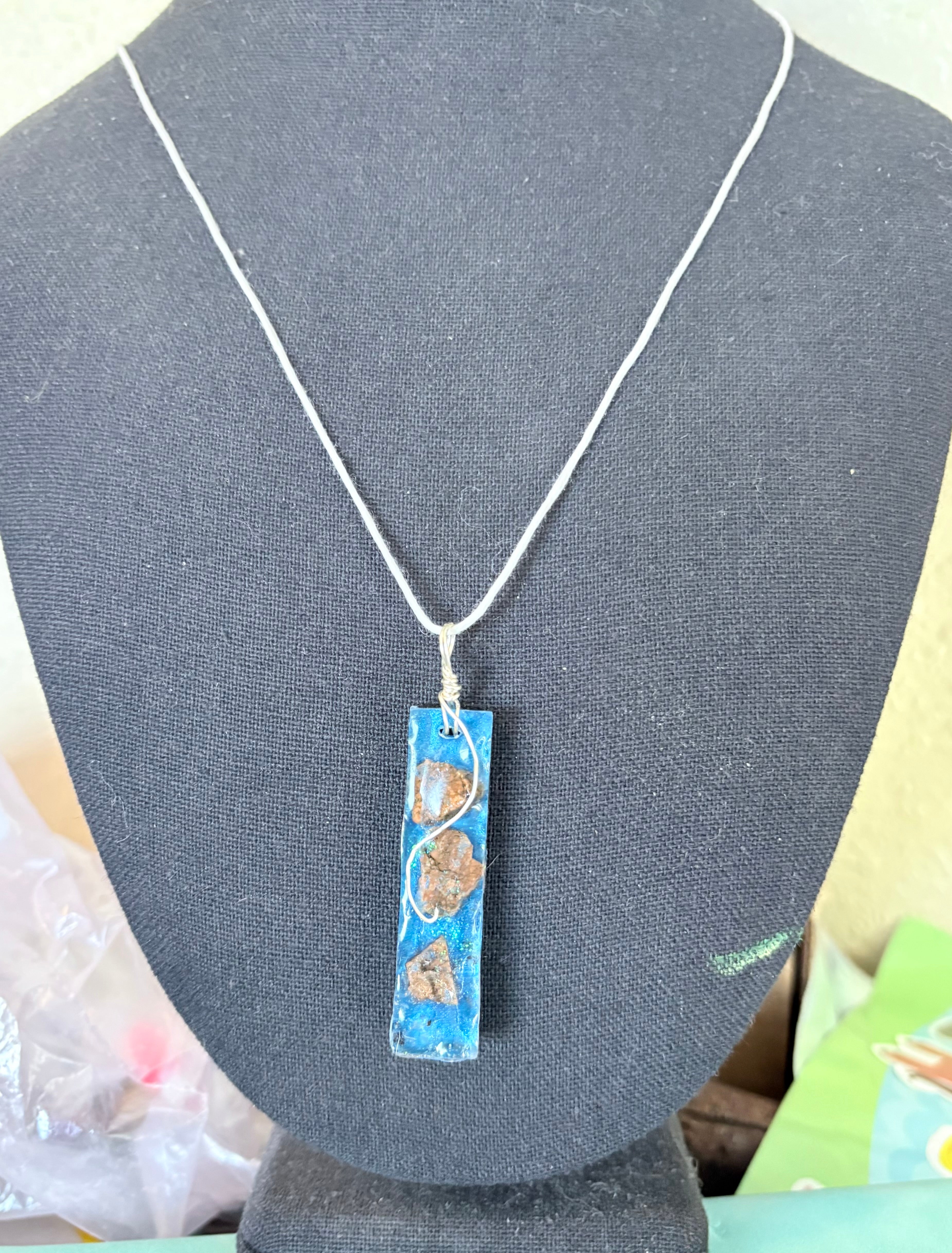 Quiet Waters Necklace | Stones in Blue Resin Pendant