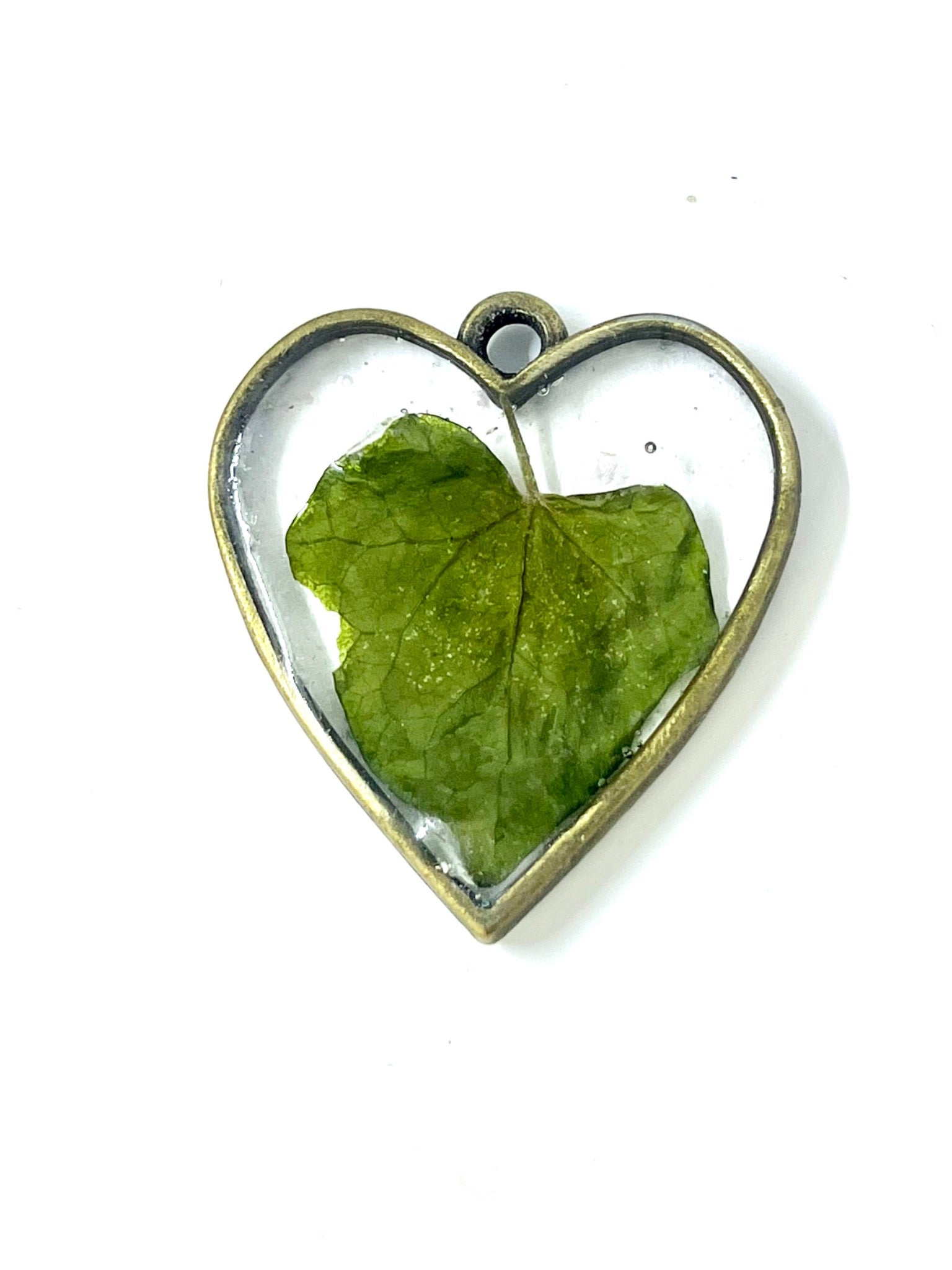Heart shaped pendant necklace with real ivy leaf preserved in clear resin