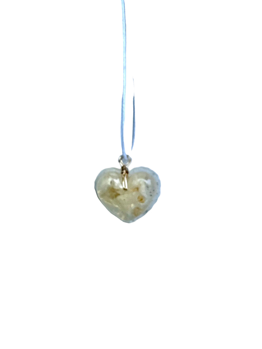 Heart-shaped pendant necklace on a white background