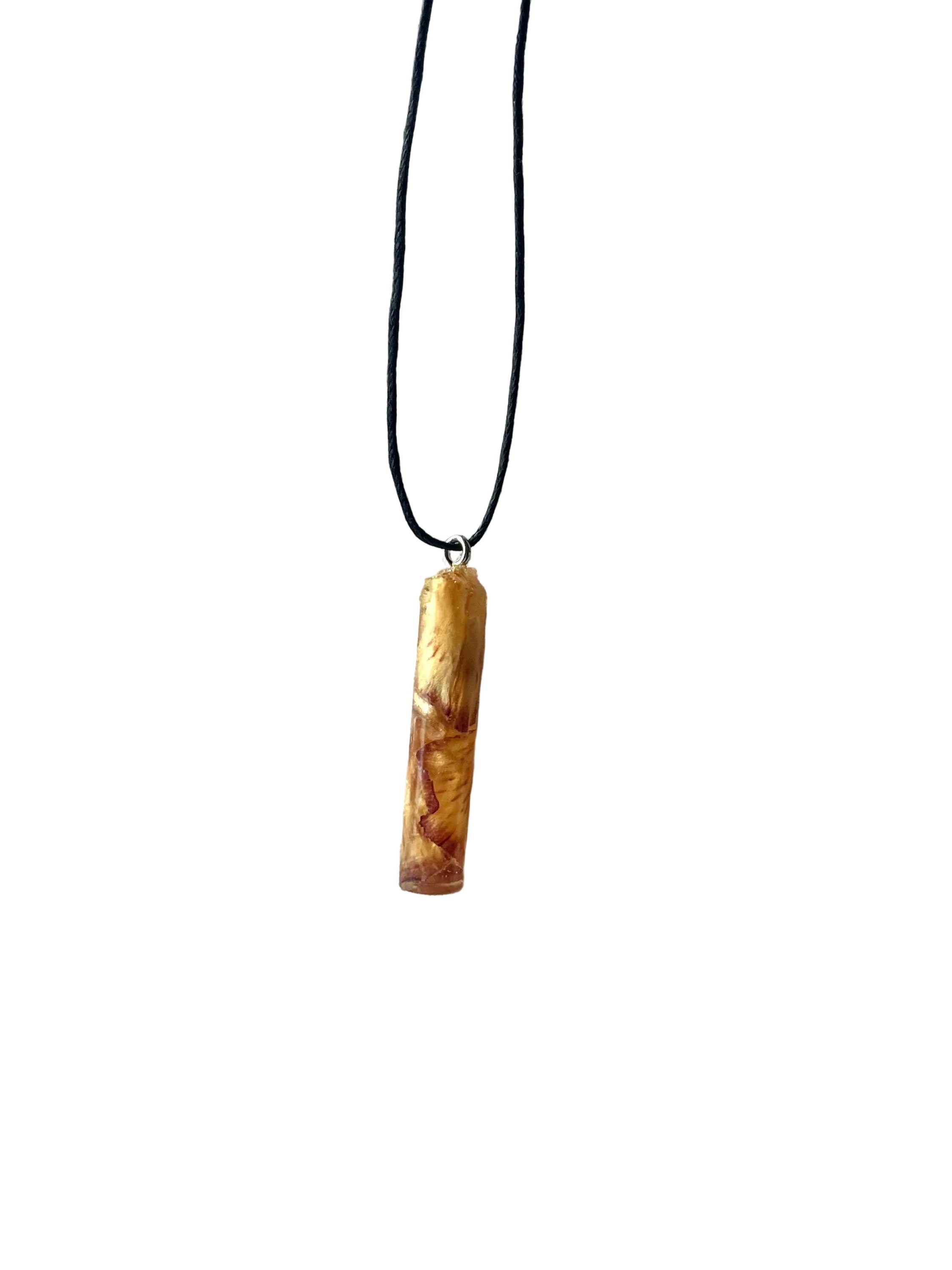 Amber pendant necklace on a white background