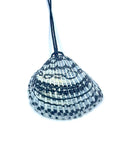 Shell decorated with black and white pattern on a white background