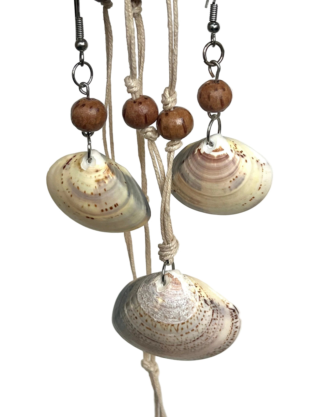 Shell and wooden bead earrings and matching necklace on a white background